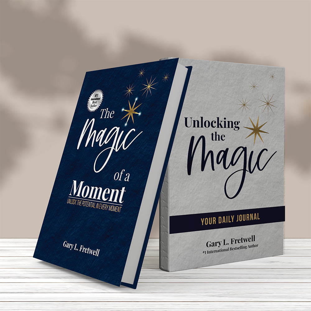 Cover of “The Magic of a Moment” by Gary L. Fretwell, #1 international bestseller, featuring gold stars on a navy background.