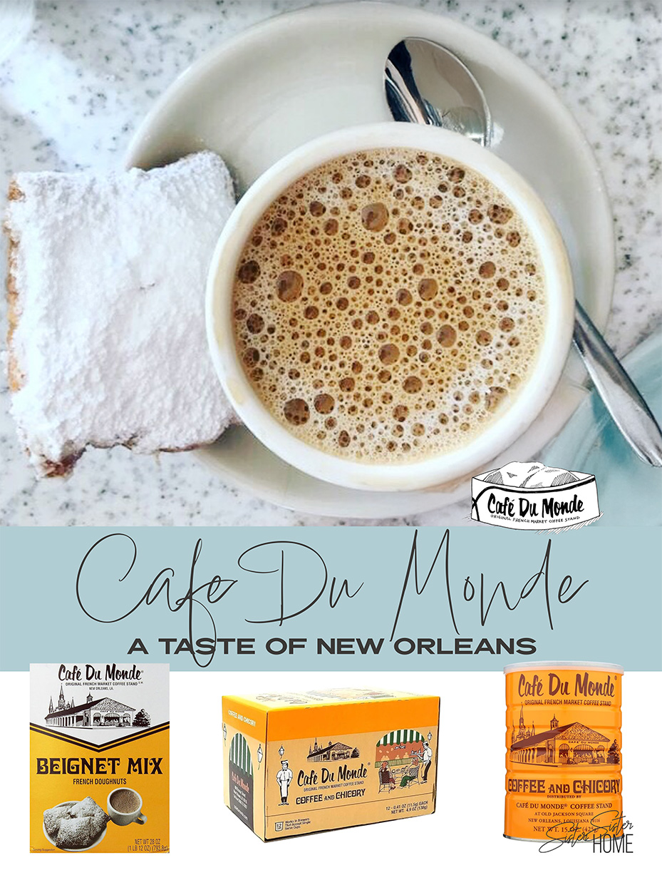 Cup of Café Du Monde coffee with a beignet on a marble table, featuring three Café Du Monde products—beignet mix, K-Cups, and coffee canister.