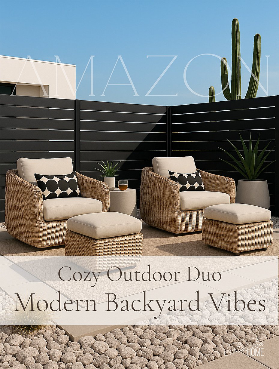 Create the perfect modern patio retreat with this cozy outdoor duo featuring rounded wicker lounge chairs, matching curved ottomans, and bold black-and-white lumbar pillows. Set against a sleek black slat fence and desert-inspired landscaping, this design blends comfort and contemporary style. Ideal for relaxed outdoor lounging, this space showcases Amazon finds that bring texture, warmth, and visual impact to your backyard or patio.
