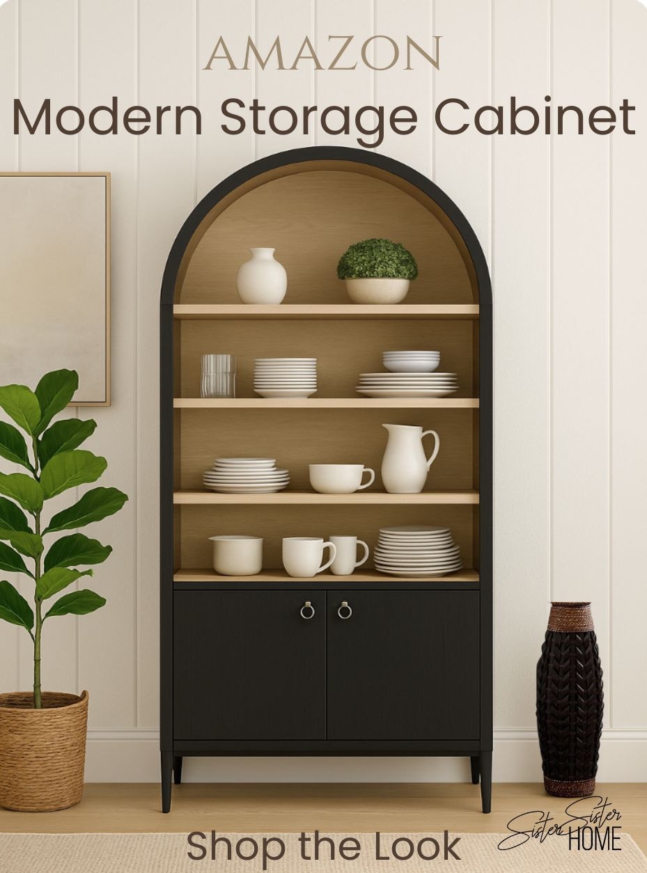 Arched black wood cabinet with open shelving and hidden storage