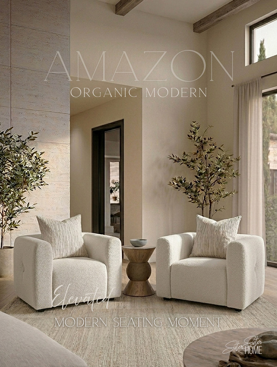 organic modern living room with boucle accent chairs wood side table textured rug and olive trees