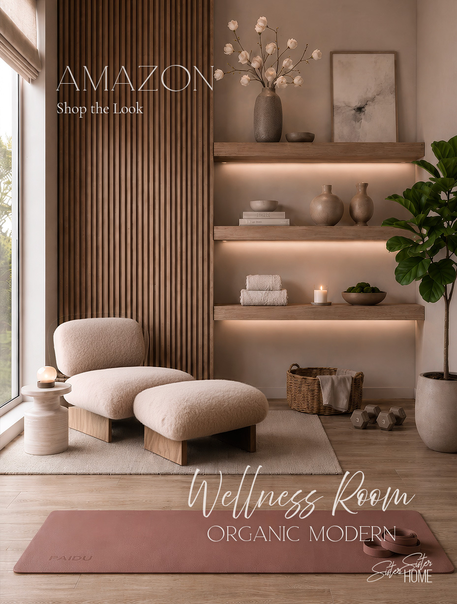 Organic modern wellness room with boucle chair and ottoman, blush yoga mat, fiddle leaf fig tree, open shelves, neutral decor, and soft warm lighting.