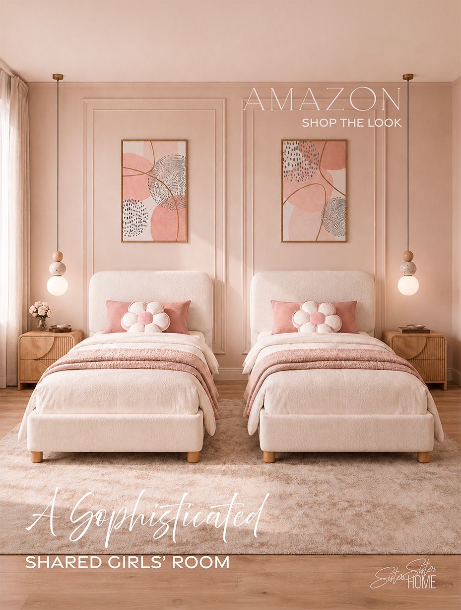 Sophisticated shared girls’ room with twin cream bouclé beds, blush bedding, floral pillows, natural oak nightstands and pendant lights.